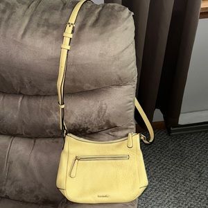 Very good used small leather Vera Bradley crossbody.